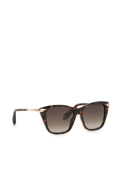 Lunettes de soleil œil de chat en écaille de tortue avec verres marron dégradés et accents métalliques dorés sur les branches.
