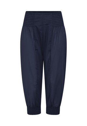 Marineblå korte bukser med bred elastisk smocket talje og ankellukkere, løstsiddende tilspidsede ben, glat stoftekstur.