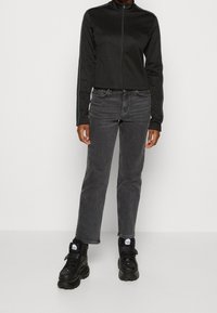 Weekday Chaqueta de entrenamiento - black
