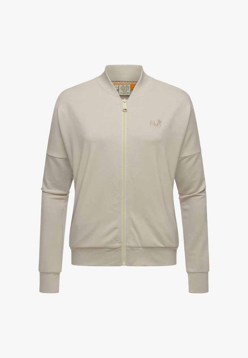 Light beige zip-up bomber jacket made of soft fabric. Features ribbed cuffs and collar, with a subtle logo embroidered on the chest.