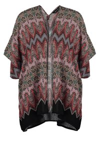 Kimono-liknande topp med ett flerfärgat zigzag-mönster i röd, grön och svart. Tillverkad av lättviktsmaterial med korta ärmar.