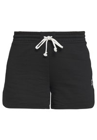 Pantalones cortos de algodón negro con un cinturón elástico en color crema. Presentan costuras laterales y un pequeño logo en la parte inferior de la pierna derecha.