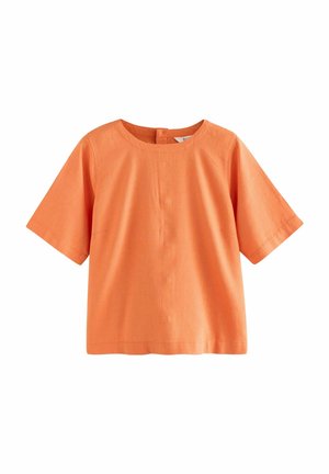 Orange short-sleeve blouse with round neckline and back button closure, made of lightweight fabric.