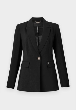 Black blazer made from textured fabric, featuring a single button closure, two front pockets, and a satin lining. Notable logo accent on pocket.