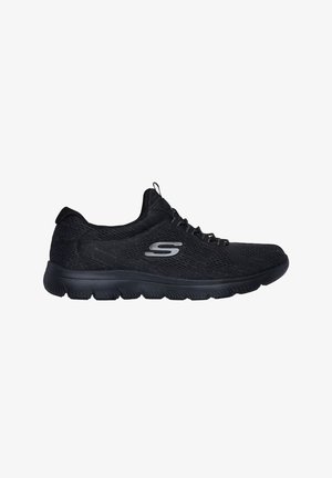 Black athletic shoes with a textured mesh upper, lace-up design, and cushioned sole. Features a silver logo on the side.