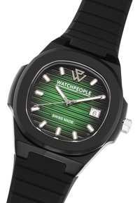 Black rubber watch with a green textured dial, silver hour markers, and a date display. Features an octagonal case and Swiss Made label.
