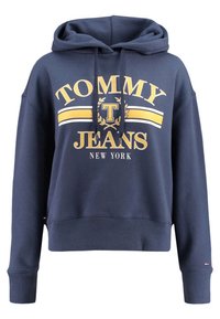 Navyblå kort hoodie i bomull med dragsko och gul text "TOMMY JEANS NEW YORK" samt en logografik i mitten.