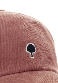 Casquette en velours côtelé rose avec un petit arbre noir brodé en outline blanc sur le panneau avant.