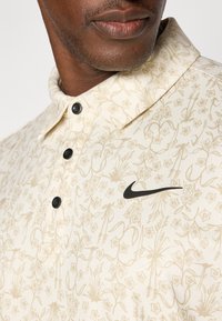 Nike Golf TOUR PRINT - Polotričko - pale ivory/black