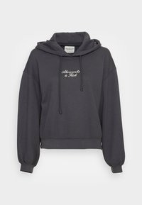 Hoodie corto grigio scuro con cappuccio regolabile, maniche oversize e logo ricamato sulla parte anteriore. Materiale morbido in misto cotone.