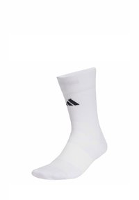 White athletic sock, mid-calf length, made of cotton blend, featuring ribbed texture and a black logo on the ankle.