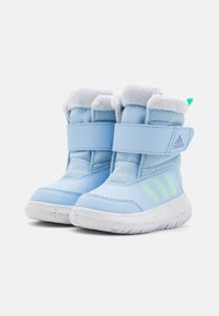 adidas Performance WINTERPLAY KIDS - Zimní obuv - glow blue/blue spark/clear mint