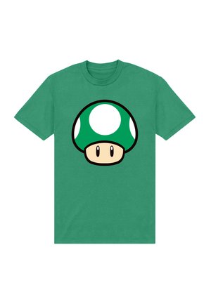T-shirt verde in cotone con una grande grafica di un fungo verde con macchie bianche e un cappello beige, contornato di nero.
