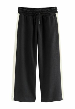 Schwarze Jogginghosen mit einem weißen seitlichen Akzent, ausgestattet mit einem elastischen Bund und Kordelzug. Hergestellt aus weichem, dehnbarem Stoff.