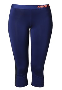 Leggings courts Nike Pro bleu marine avec panneaux latéraux noirs et un logo Nike Pro orange sur la ceinture.