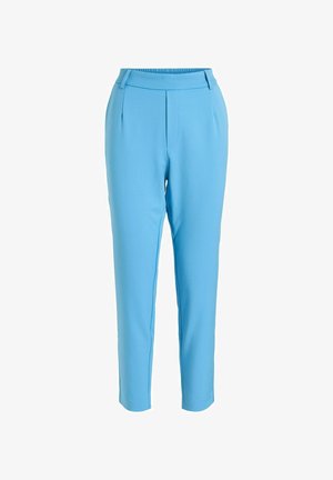 Vaaleansiniset räätälöidyt housut, joissa sileä viimeistely, litteä etuosa, kapea istuvuus ja joustava vyötärönauha mukavuutta varten.