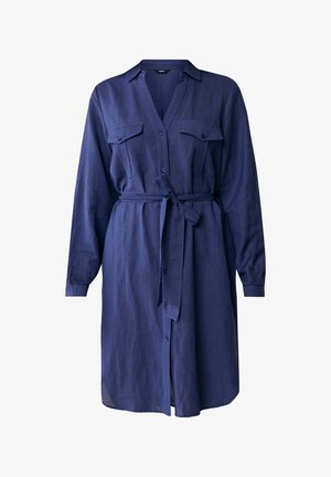 Vestido camiseros de color azul marino en lino, con mangas largas, cierre de botones en la parte delantera, dos bolsillos en el pecho y un cinturón de tela a juego en la cintura.
