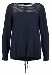 Marineblaue Bluse mit langen Ärmeln, einem strukturierten oberen Bereich, gerafftem Saum und einem vorderen Kordelzug für eine verstellbare Passform. Glatte Stofftextur.