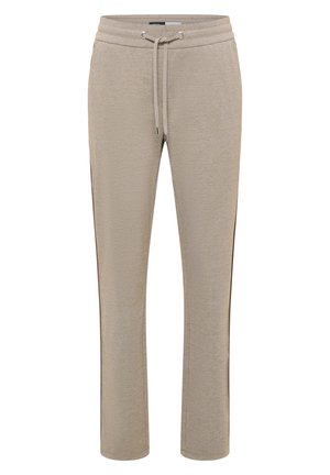Pantalons de survêtement en maille beige avec taille élastique, cordon de serrage, poches latérales et rayures marron sur les côtés.