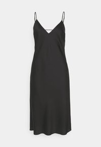 Black slip dress with thin adjustable straps, V-neckline, smooth texture, and a straight silhouette, featuring a knee-length hem.