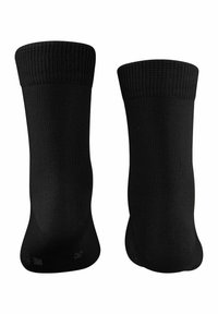 Calcetines negros con un puño acanalado, textura suave y forma ajustada. Sin logotipos ni patrones visibles. Aptos para uso casual o atlético.