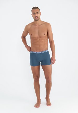 Herren Boxershorts in Marineblau aus weichem Stoff, mit einem hellen, elastischen Taillenbund, der mit "PIER ONE" gebrandet ist.