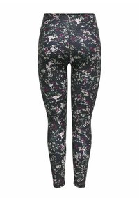 Tights tillverkade av stretchtyg har en mörk bakgrund med ett flerfärgat abstrakt blommönster i rosa, vitt och grönt.