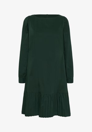 Robe vert foncé à manches longues, décolleté carré et ourlet à volants. Fabriquée en tissu lisse avec des détails froncés aux épaules.