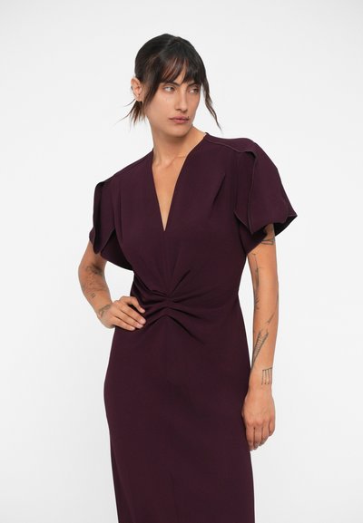 Merlot-colored dress with a deep V-neck, flutter sleeves, twisted front detailing, and smooth, fitted fabric.