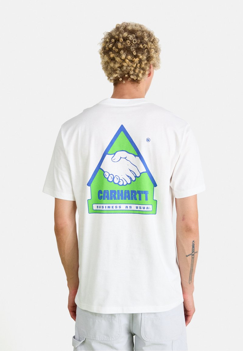White cotton T-shirt featuring a graphic on the back with green and blue colors, depicting a handshake within an outlined triangle.