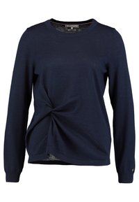 Pull à manches longues bleu marine avec un design torsadé à l'avant, un col rond et un tissu en maille texturée. Accents clairs près de l'ourlet et des poignets.