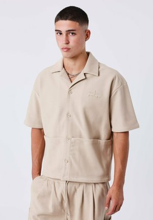 MANCHE COURTE BOXY - Camicia - beige