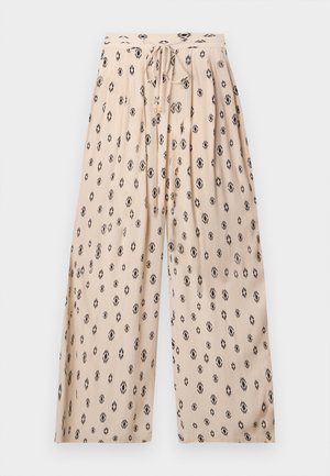 Μπεζ παντελόνια με φαρδύ πόδι και μαύρο γεωμετρικό σχέδιο, ελαστική μέση και κορδόνι μπροστά με διακοσμητικά άκρα σε χρυσό χρώμα.