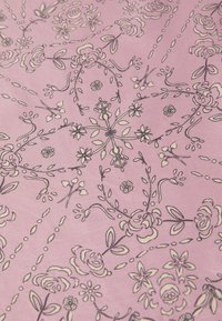 Pink fabric featuring a floral pattern with outlined roses, leaves, and small flowers, creating a textured, intricate design.