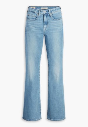 Jeans en denim bleu clair évasés avec une taille haute, dotés de poches avant, d'une fermeture à bouton unique et d'un léger délavage le long des jambes.