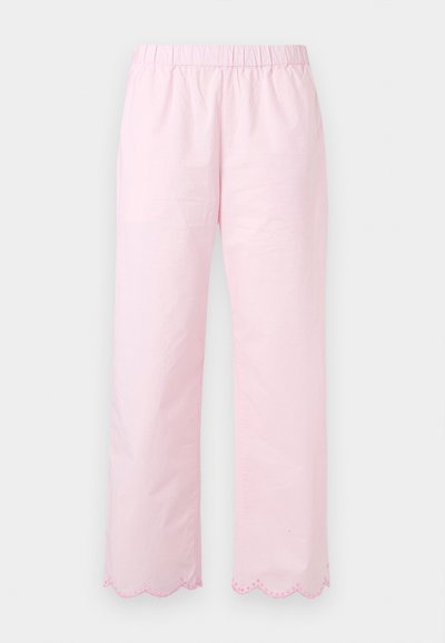 Ροζ ανοιχτό ραστερ παντελόνια με ελαστική μέση, φαρδιές παντελόνες και κυματιστές άκρες κεντημένες με μικρές οπές.