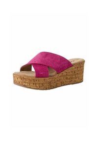 Pink suede wedge sandals with a cork platform, featuring a crossover strap design and a contoured footbed for comfort.