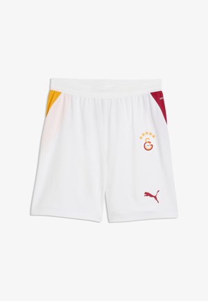 Shorts de sport blancs avec des accents latéraux rouges et jaunes, avec un logo Puma rouge et un emblème du club de football Galatasaray avec cinq étoiles.