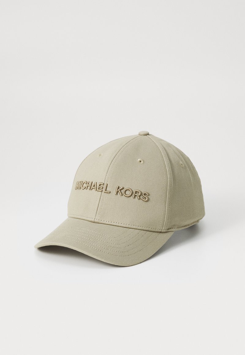 Bež puuvillane beiseballi müts, millel on sarnases värvitoonis tikitud "MICHAEL KORS" logo, kuuepaneelikujundus ja kumer visiit.