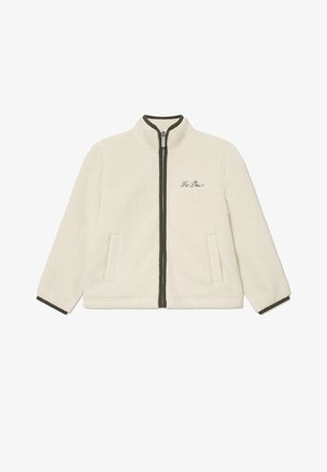 Kreem värvi fliisist lukuga jakk kõrge kraega, tumeroheline äär ja kaks esist pocketsit. Rinnal on tikitud kiri.