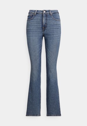 Schlagjeans aus blauem Denim mit hohem Bund, fünf Taschen, kontrastierenden Nähten und einer glatten Textur.