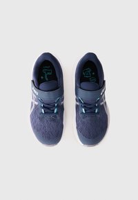 Navy athletic shoes with a textured mesh upper, accented by light blue laces and strap. White sole with subtle branding on the side.