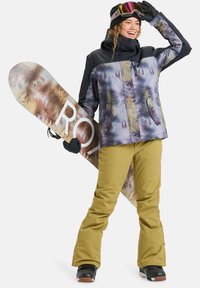 Snowboard attire featuring a patterned purple jacket with a black upper section, yellow pants, and a snowboard with abstract designs.