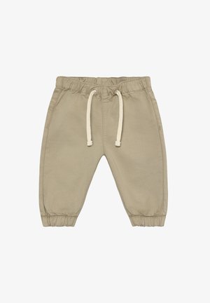 Beige Jogginghosen mit elastischem Bund und Kordelzug, an den Knöcheln mit Bündchen versehen, gefertigt aus einem weichen, strukturierten Stoff.