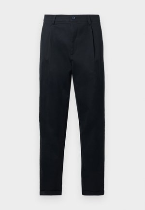 Svarte bomullsbukser med rett snitt, med frontfolder, knappelukking og oppbrettede mansjetter. Glatt tekstur uten mønstre.