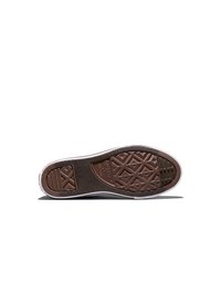 Podeszwa trampka Converse All Star z brązowym, wzorzystym bieżnikiem i widocznym logo na środku, pokazana na białym tle.