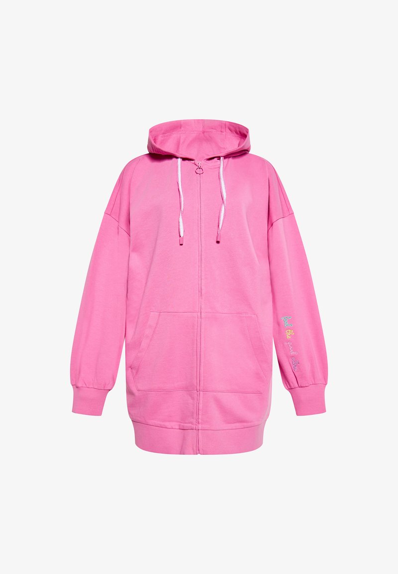 Rózsaszín kapucnis pulóver cipzárral, elülső zsebekkel és rugalmas mandzsettákkal. Az "érezd a jó energiákat" szöveg több színben hímzett.