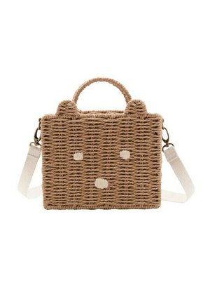 Borsa rettangolare di paglia intrecciata con due piccole orecchie sulla parte superiore, tracolla bianca regolabile e semplici dettagli ricamati di un volto sul davanti.