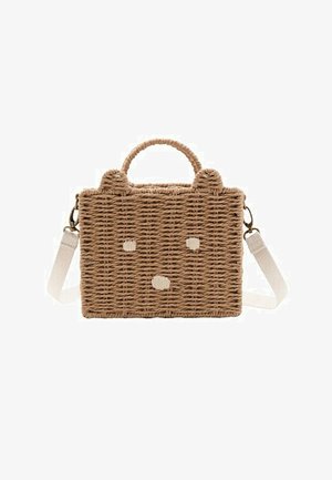 Borsa rettangolare di paglia intrecciata con due piccole orecchie sulla parte superiore, tracolla bianca regolabile e semplici dettagli ricamati di un volto sul davanti.