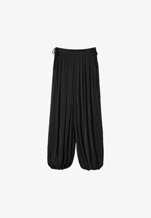 Loose black pants with gathered elastic cuffs and waist ties, made of lightweight, flowy fabric.